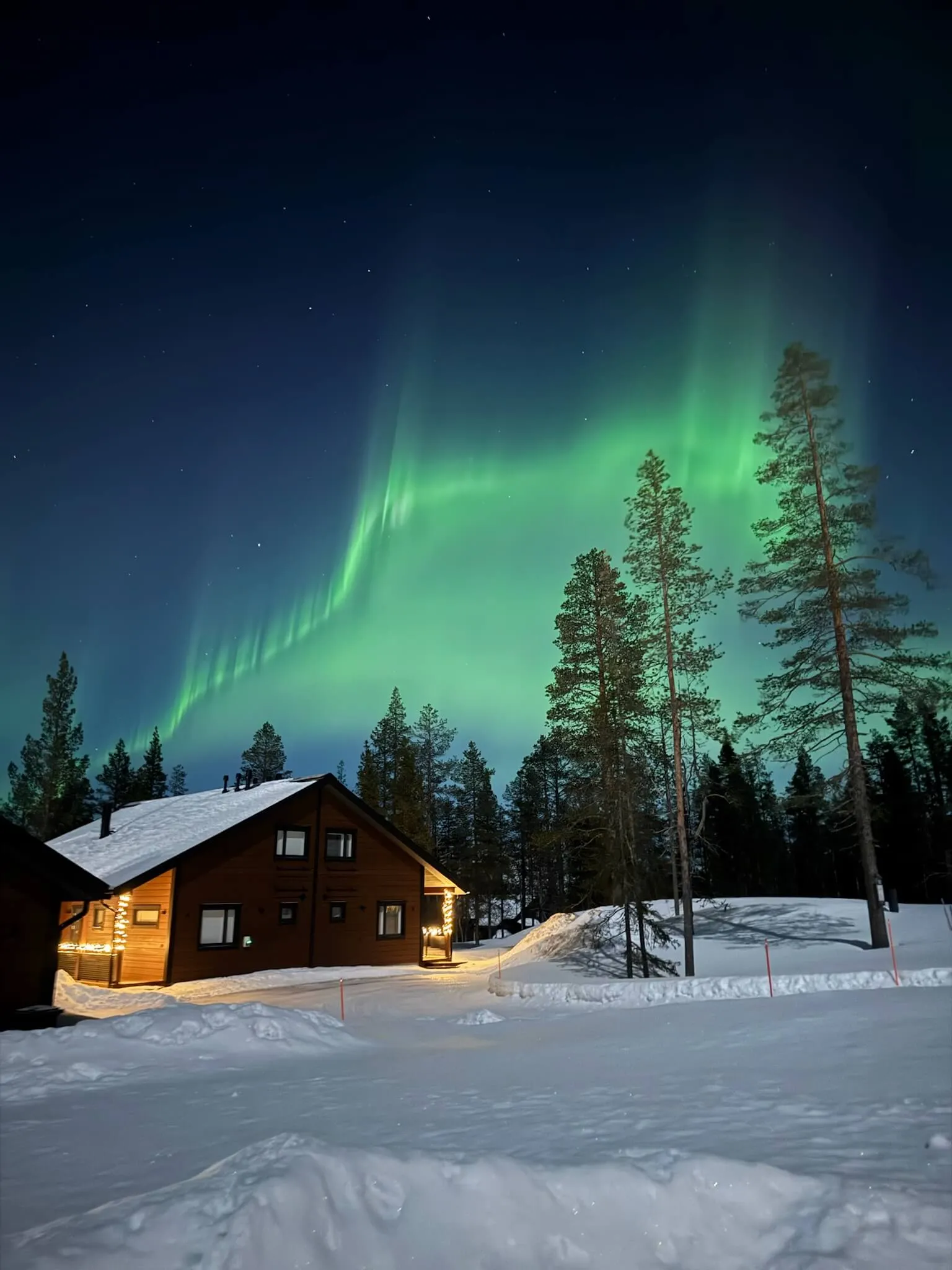The aurora borealis above a house